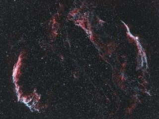 Veil Nebula 2400 Veil nebula in a beautiful color pallet of red, blue, and white.