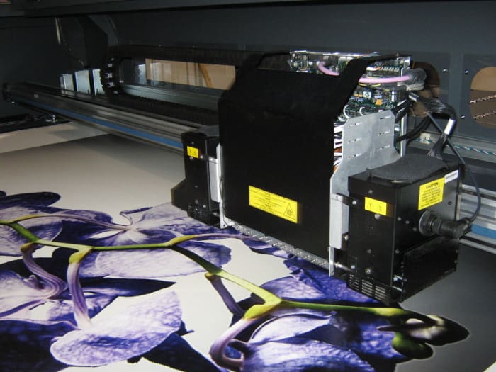 Grand-format UV printer printing flowers while under development
